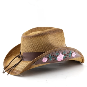 Brown straw western cowboy hat with embroidered rose patch and leather strap details