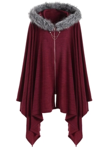 Detail of dark red knit hooded poncho with plush grey faux fur trim and metal chain