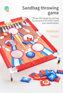 Detail of the foldable target board with score holes and colorful bean bags for kids