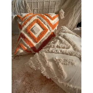 Bohemian tufted pillow covers with geometric patterns and tassels for home decor