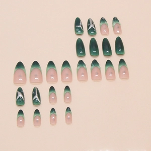 Dark green French gradient press-on nails with silver star accents and 24-piece almond set