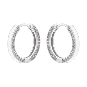 Detail showing polished silver hoop earrings with clear cubic zirconia inlays