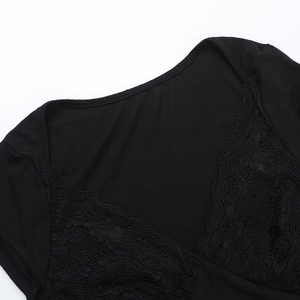 Detail of V-neck lace patchwork on black slim fit short sleeve top for women