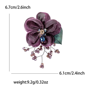 Elegant purple lace flower brooch with bead tassels and dimensions 6.1cm by 6.7cm