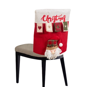 Christmas chair back cover with embroidered text and 3D Santa Claus figurine decor
