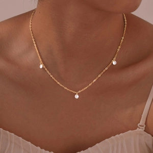 Minimalist gold plated stainless steel necklace with three clear zircon crystal charms