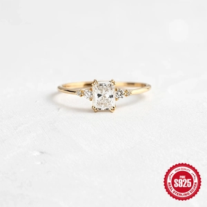 Luxurious S925 silver gold-plated ring with a large rectangular diamond and side stones