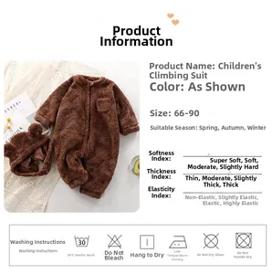 Detail of dark brown baby plush romper with bear ear hat on soft knitted background