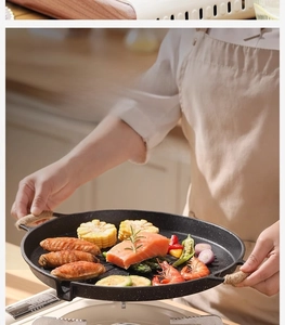 Detail of round non-stick grill pan with hemp rope handles being held by hand