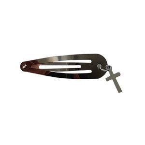 Silver metal snap clip hair accessory with cross pendant on white background