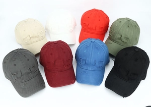 Detailed view of distressed baseball caps in eight colors showing ripped edges and frayed fabric