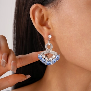 Vintage style water drop geometric earrings with light blue crystals and silver needles