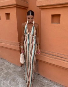 Detail of multi-color crochet maxi dress with V-neck and wave pattern texture
