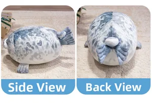 Side and back view of a soft gray spotted seal plush pillow with a heart pattern