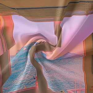 Detailed macro view of bohemian silk tapestry with sunset beach landscape print