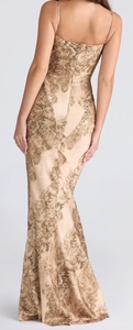 Close-up of champagne gold floral jacquard fabric on back of fitted bodycon dress