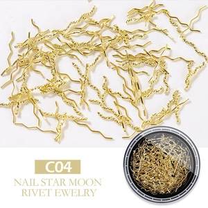 Detailed macro view of C04 wavy gold metal nail art rivets for star moon manicure sets