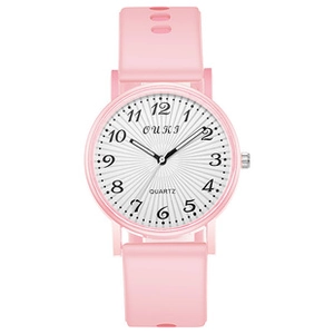 Detail of pink silicone strap women's watch with white dial and clear Arabic numerals