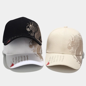 Baseball caps with dragon embroidery and Chinese calligraphy in black, white, and beige