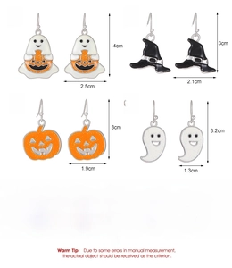 Detail view of Halloween earrings showing weights and sizes for ghost and pumpkin styles