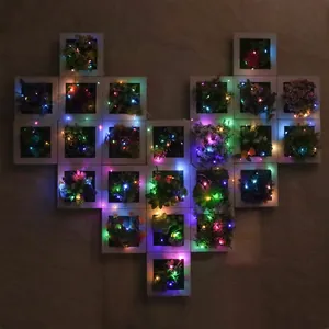 Heart-shaped wall decor with 20 LED glowing square frames and artificial succulents