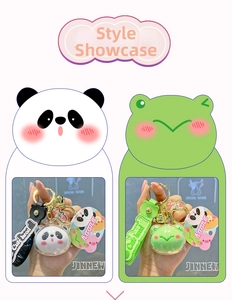 Detail of cartoon panda and frog acrylic keychains with soft silicone straps and bells