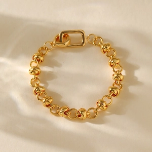 Minimalist gold-plated knot chain bracelet with twisted bead detail and rectangular clasp