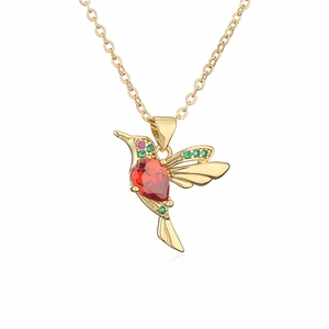 Elegant gold hummingbird necklace with red teardrop zircon and colorful crystal accents