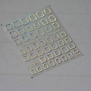Detailed macro view of 5D holographic nail stickers featuring laser gold geometric frames