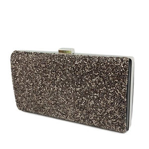 Side view of elegant evening clutch bag with dense dark rhinestones and metal frame