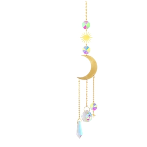 Detail of golden moon and sun ornaments with AB colorful crystal pendants