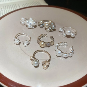 French vintage silver ring set with elegant pearls and sparkling zircon accents