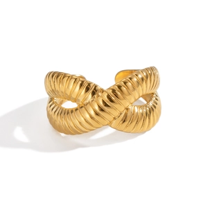 Detail of 18k gold plated criss-cross ring showing twisted rope texture and open band design