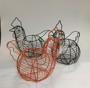 Three chicken-shaped iron wire baskets for eggs or fruit in orange and black metal finishes