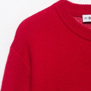 Red knit cardigan with pony jacquard pattern and crew neck for winter season