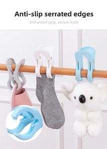 Detail of large plastic windproof clips with non-slip serrated teeth for heavy items