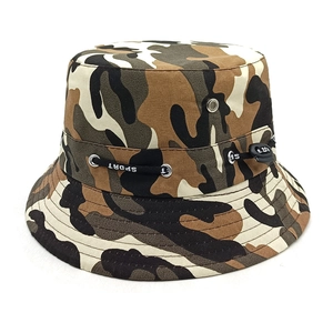 Macro detail of camouflage fishing hat featuring metal eyelets and a SPORT drawcord