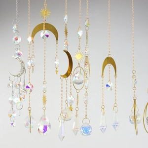 Crystal suncatchers with moon and sun charms in gold and silver finishes for gardens