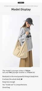Beige corduroy shoulder bag with wide strap on a model, casual minimalist tote style