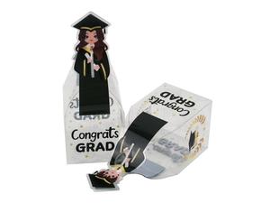 Detailed view of graduation candy boxes with Congrats GRAD prints and student figures