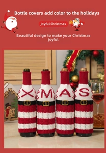 Detail of four knitted Xmas wine bottle covers with Santa belt gold buckles and letters