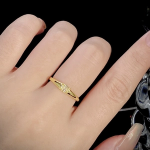 S925 sterling silver gold ring featuring three delicate yellow gems worn on finger