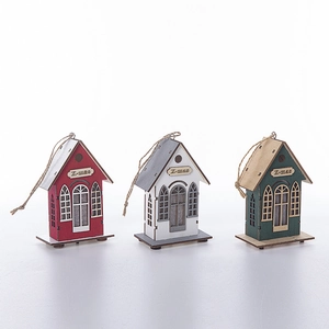 Three wooden Christmas house ornaments with laser-cut X-mas engraving and hanging ropes