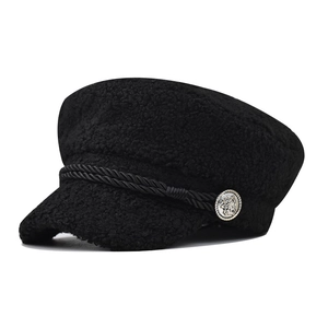 Black Sherpa baker boy hat with braided rope and embossed lion metal button detail