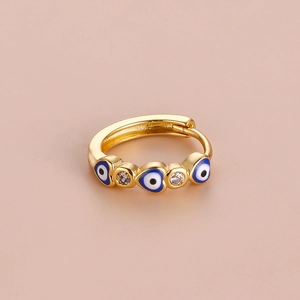 Bohemian gold hoop earring with heart shapes, blue evil eye motifs and sparkling crystals