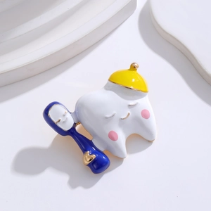 Cute enamel tooth brooch with mini toothbrush detail and hat in colorful alloy