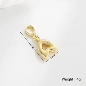 Polished gold heart charm pendant with lobster clasp measuring 3cm by 1.3cm in size