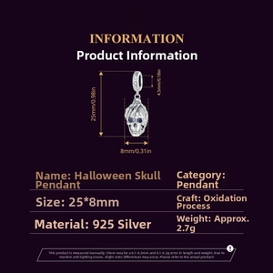Macro view of 925 silver skull charm with blue eyes and oxidized vintage finish