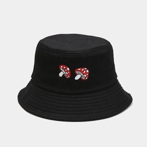 Close-up of dual mushroom embroidery on black cotton twill bucket hat with neat stitching