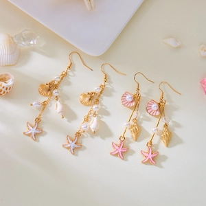 Starfish and seashell drop earrings with pearls in gold and pink beach style